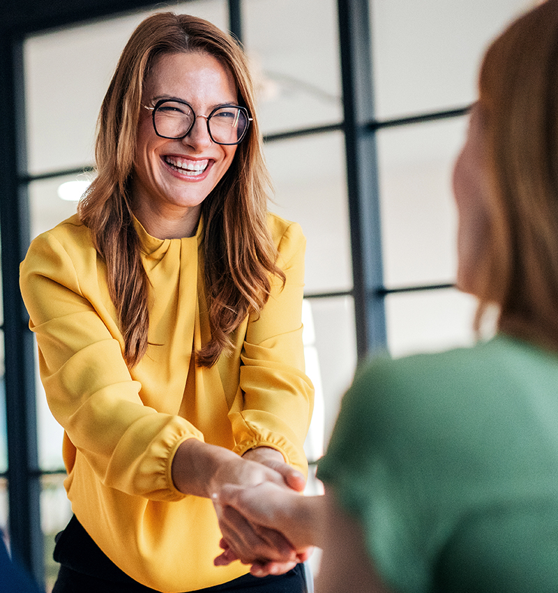 get-a-job-img Woman shaking hands with her new employer, happy to finally get a job