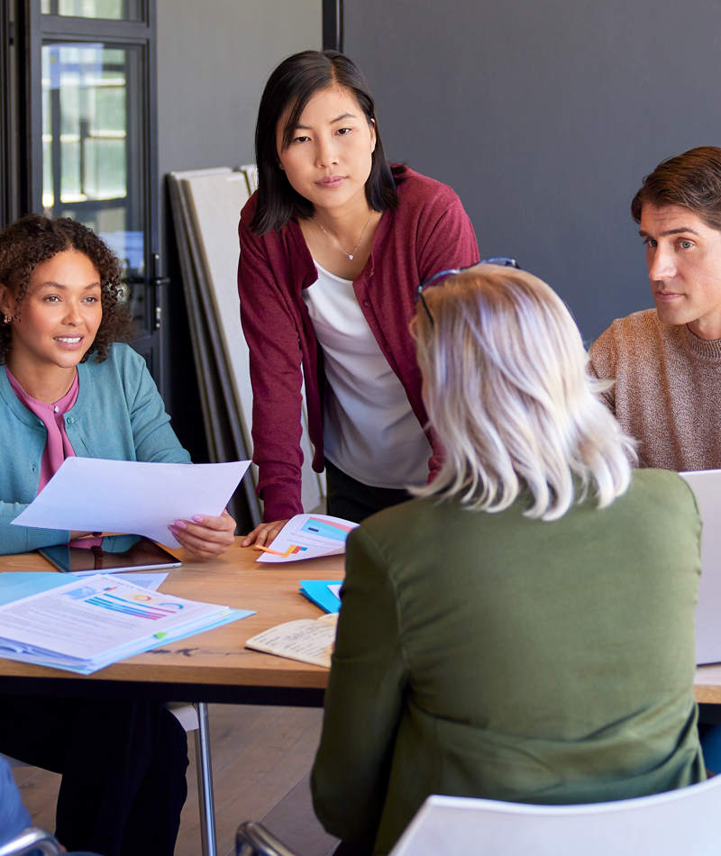 team-cohesion-challenges-img Diverse team having challenges working together as one cohesive team