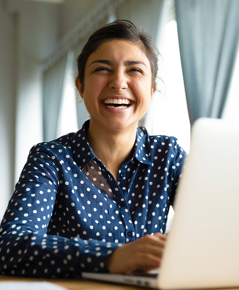 woman-in-flow-state-img Happy, fully engaged Indian woman enjoying her work and her job because she knows how to tap into her Motivational Flow