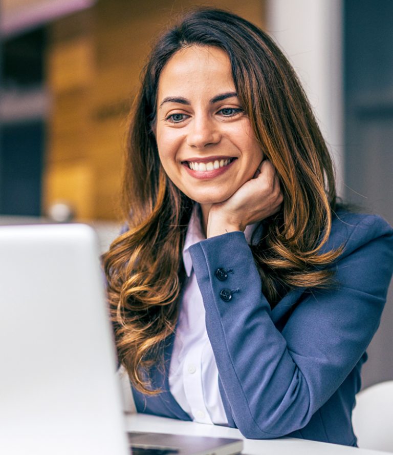 A woman reviews her MCode results with a Certified MCode Coach during an Impact Session