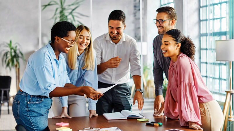 knowledge workers discussing a document