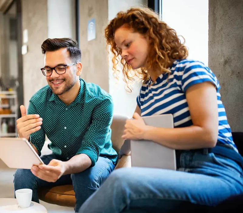 Two colleagues reviewing their MCode results