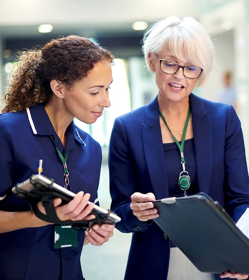 Nursing Managers reviewing charts
