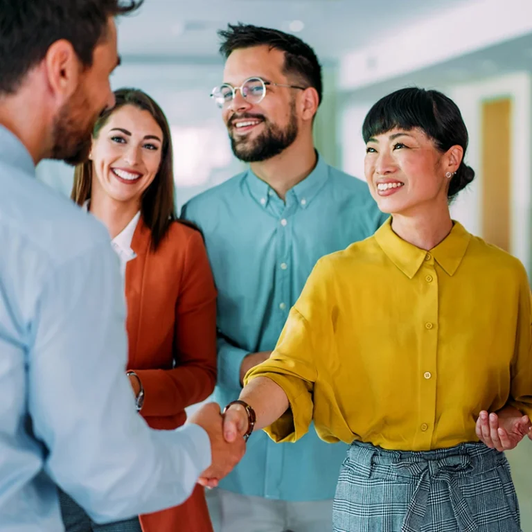 A team welcoming a new employee