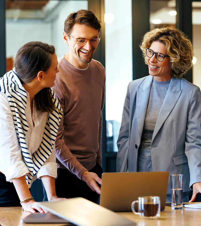 A team meeting at work to review their dimensions of motivation