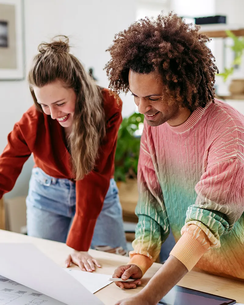 Work colleagues excelling together on a project